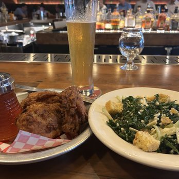 The Eagle Charlotte - 1/4 fried chicken (dark). Kale salad. Protagonist Dolly Draft beer - Southern Near Me - Charlotte, North Carolina The Eagle Charlotte - 1/4 fried chicken (dark). Kale salad. Protagonist Dolly Draft beer - Southern Near Me - Charlotte, North Carolina