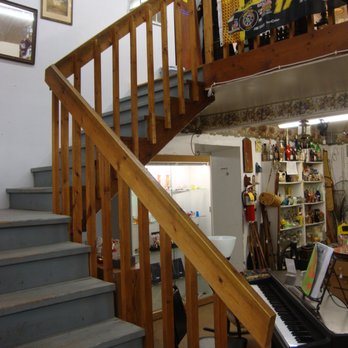 Treasures Under Sugar Loaf - Steps leading to the 3rd floor balcony area. - Antiques Near Me - Winona, Minnesota