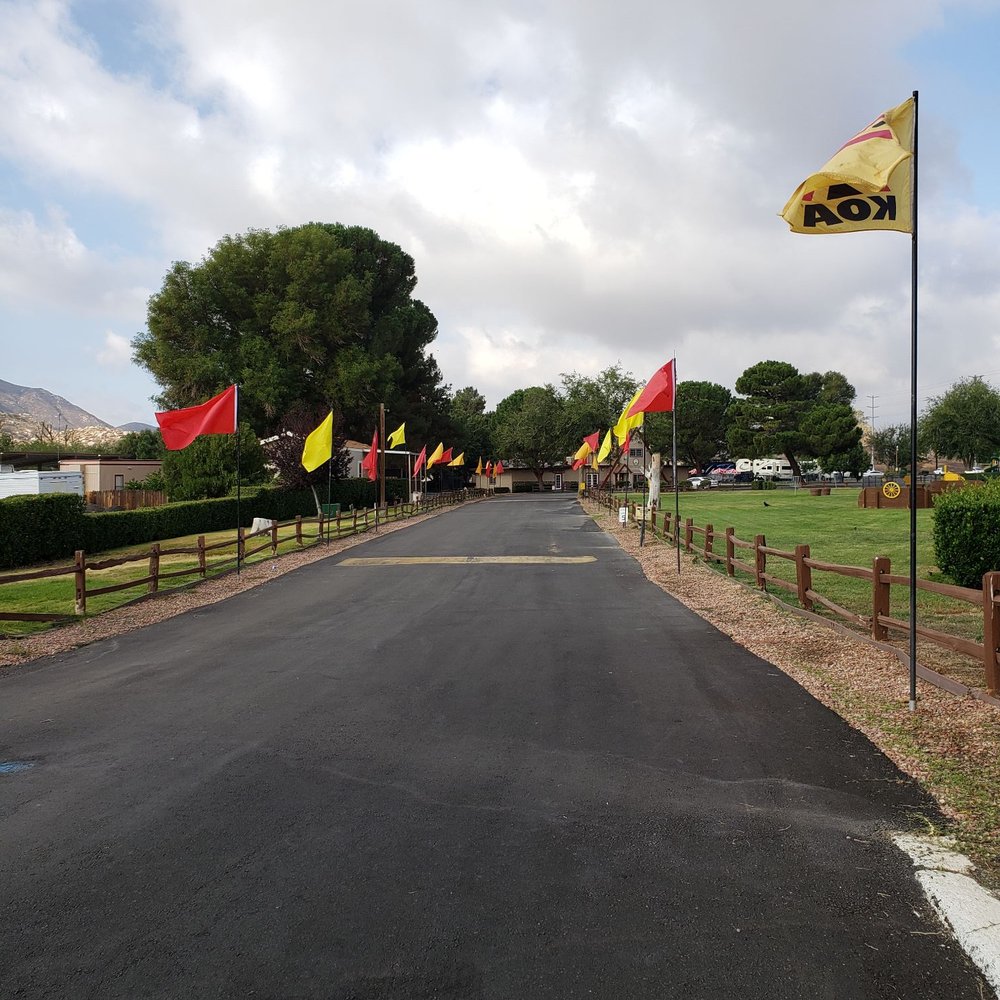 Banning Stagecoach KOA - Flags at entrance - Campgrounds Near Me - Banning, California