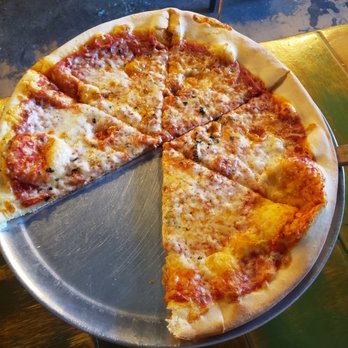 Sliced - Rookie pizza, cheese is 2.5" from edge of pie..Sad. - Pizza Near Me - Hoschton, Georgia