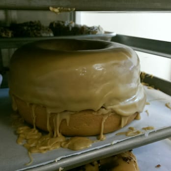 Revolution Doughnuts - They even make these big donut cakes. - Donuts Near Me - Decatur, Georgia