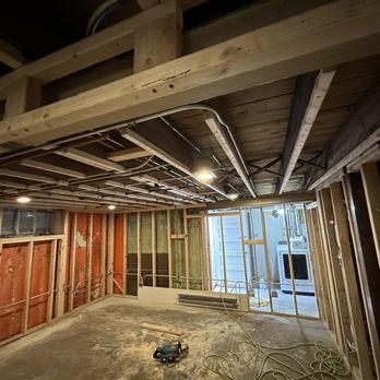 Mank Construction - a room under construction - Decks & Railing Near Me