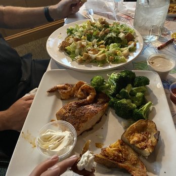 Condor Cafe - We shared a large chicken Caesar salad, and the salmon dinner that could with shrimp and two sides. It was delicious :) - American Near Me - Pine Mountain Club, California