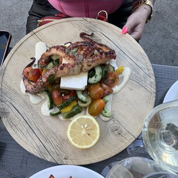 Lucille's - Half order of grilled octopus with Greek salad - Steakhouses Near Me - Brossard, Quebec Lucille's - Half order of grilled octopus with Greek salad - Steakhouses Near Me - Brossard, Quebec