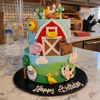 Lesley's Creative Cakes - Our cute little farm themed birthday cake complete with the cutest little baby chick on top of the sign. - Bakeries Near Me - MESA, Arizona