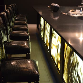 Stone, Inc. - Restaurant Bar top with Onyx backlit walls - Building Supplies Near Me - Framingham, Massachusetts Stone, Inc. - Restaurant Bar top with Onyx backlit walls - Building Supplies Near Me - Framingham, Massachusetts