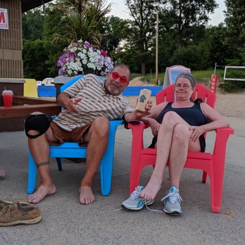 The Cabana Beach Bar - a man and a woman sitting in chairs - Bars Near Me - Plattsburgh, New York