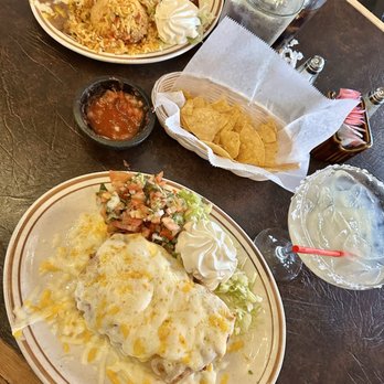La Capilla Mexican Restaurant - The perfect Chimichanga (add cheese), chips and salsa, and a banger house margarita. - Mexican Near Me - La Palma, California