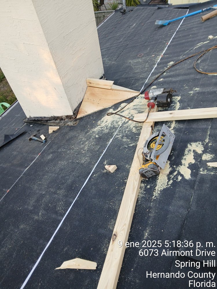 Slide of JAT Roofing