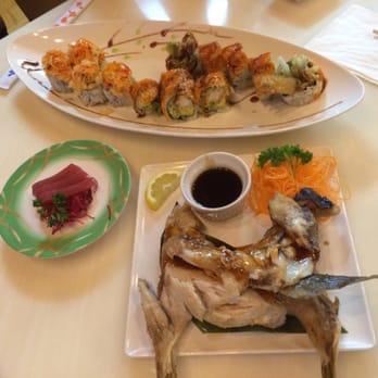 Ushio Sushi - Sushi and sashimi platter with the hamachi kama, out of this world good! - Sushi Bars Near Me - Davie, Florida