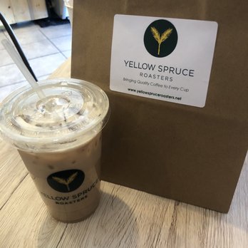 Yellow Spruce Roasters - White mocha iced latte with a bag of freshly roasted beans. - Coffee Roasteries Near Me - Scottsdale, Arizona Yellow Spruce Roasters - White mocha iced latte with a bag of freshly roasted beans. - Coffee Roasteries Near Me - Scottsdale, Arizona