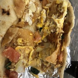 Gloria's Restaurant - Migas a la mexicana. Sorry I already took a bit. Pretty good