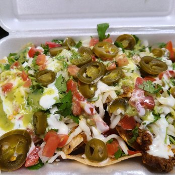 Chavo's Tacos - Omg nacho box of fun. All the textures and flavors you could ever want - Caterers Near Me - Detroit, Michigan