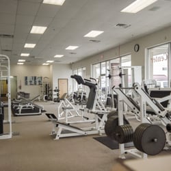 Coastal Fitness Center - A good look at the gym. Big windows, lets a lot of light in. There's cardio machines to the left (not pictured).