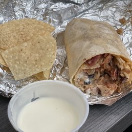 Burrito, chips, and queso Burrito, chips, and queso