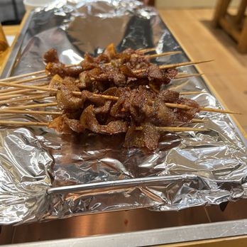 Happy Tree House BBQ - Pork intestine skewers - Barbeque Near Me - Richmond, British Columbia Happy Tree House BBQ - Pork intestine skewers - Barbeque Near Me - Richmond, British Columbia