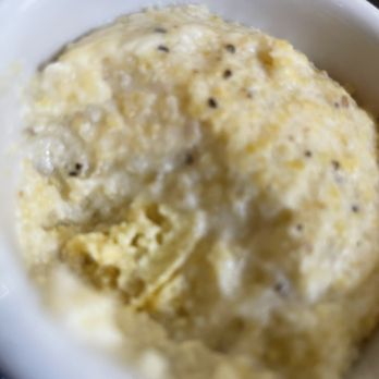 Tupelo Honey Southern Kitchen & Bar - Stone-Ground Goat Cheese Grits (GF) - Southern Near Me - Charlotte, North Carolina Tupelo Honey Southern Kitchen & Bar - Stone-Ground Goat Cheese Grits (GF) - Southern Near Me - Charlotte, North Carolina