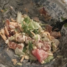 a salad in a glass bowl a salad in a glass bowl
