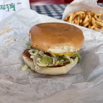Mighty Fine Burgers Arbor Walk - 1/4 lb classic Texas burger with cheese ($7.99 plus $0.49 for cheese) - Burgers Near Me - Austin, Texas Mighty Fine Burgers Arbor Walk - 1/4 lb classic Texas burger with cheese ($7.99 plus $0.49 for cheese) - Burgers Near Me - Austin, Texas