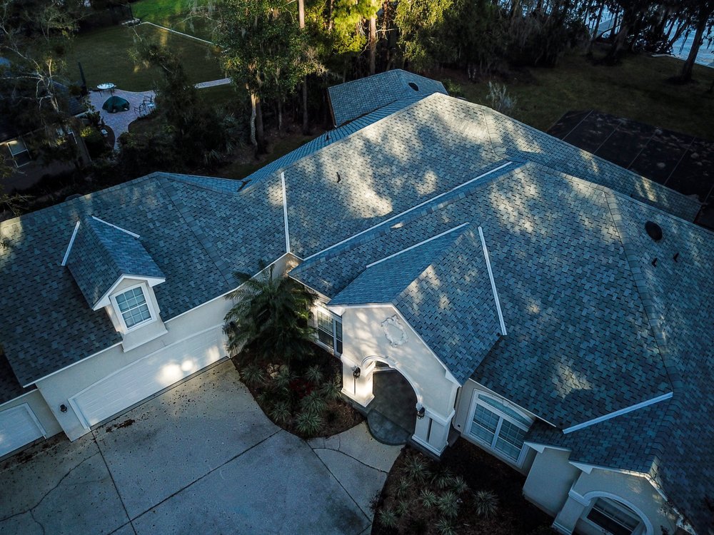 Slide of Action Roofing