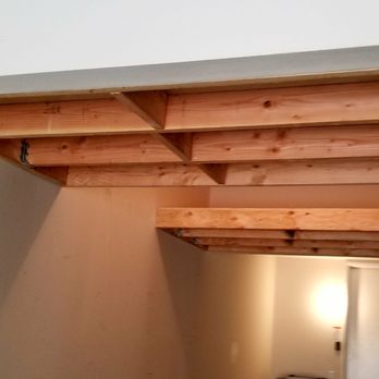 JK Drywall - Sturdy overhead garage storage w/o blocking the light using 2×6s, 3/4 in smooth plywood and joices. Excellent work! $500 total, half day. - General Contractors Near Me JK Drywall - Sturdy overhead garage storage w/o blocking the light using 2×6s, 3/4 in smooth plywood and joices. Excellent work! $500 total, half day. - General Contractors Near Me