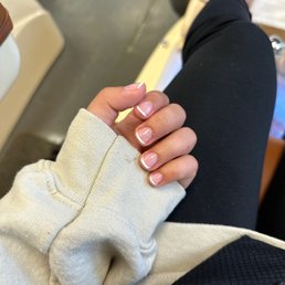 Thin French tip nails drawn with natural nail