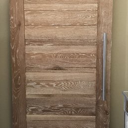 Beautiful solid barn door with modern aluminum handle.