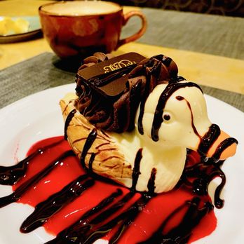 Capriccio Grill - The Peabody Famous White Chocolate & dark chocolate stuffed mousse Duck on a stream of raspberry coulis. Winners Circle :)... - Steakhouses Near Me - Memphis, Tennessee