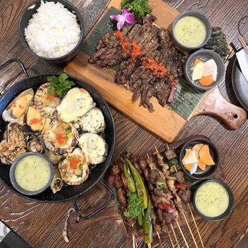 HEM Kitchen And Bar - Grilled Seafood combo $30, 5 spices grilled beef $26, & Grilled Skewers combo $16 all 4.5/stars - Vietnamese Near Me - Houston, Texas