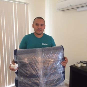 Clutter - Victor after he wrapped my tv - Self Storage Near Me Clutter - Victor after he wrapped my tv - Self Storage Near Me