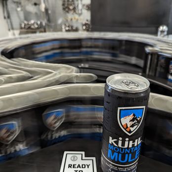 Simplicity Spirits Co. - a can of drink on a conveyor belt - Distilleries Near Me - Salt Lake City, Utah Simplicity Spirits Co. - a can of drink on a conveyor belt - Distilleries Near Me - Salt Lake City, Utah