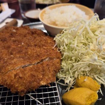 Koromo - Pork loin katsu... the two mounds of yellow things? Don't eat, mix with the katsu sauce for spice. - Japanese Near Me - Aiea, Hawaii Koromo - Pork loin katsu... the two mounds of yellow things? Don't eat, mix with the katsu sauce for spice. - Japanese Near Me - Aiea, Hawaii