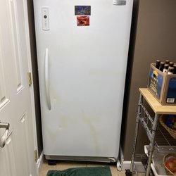 L & L Appliances Mart - Existing freezer (leaking water, hence the towel)