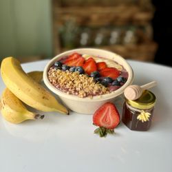Heavenly Nature Juice Bar - Berry Blessed Açaí Smoothie Bowl topped with Blueberries, Strawberries, Bananas, Granola and Honey