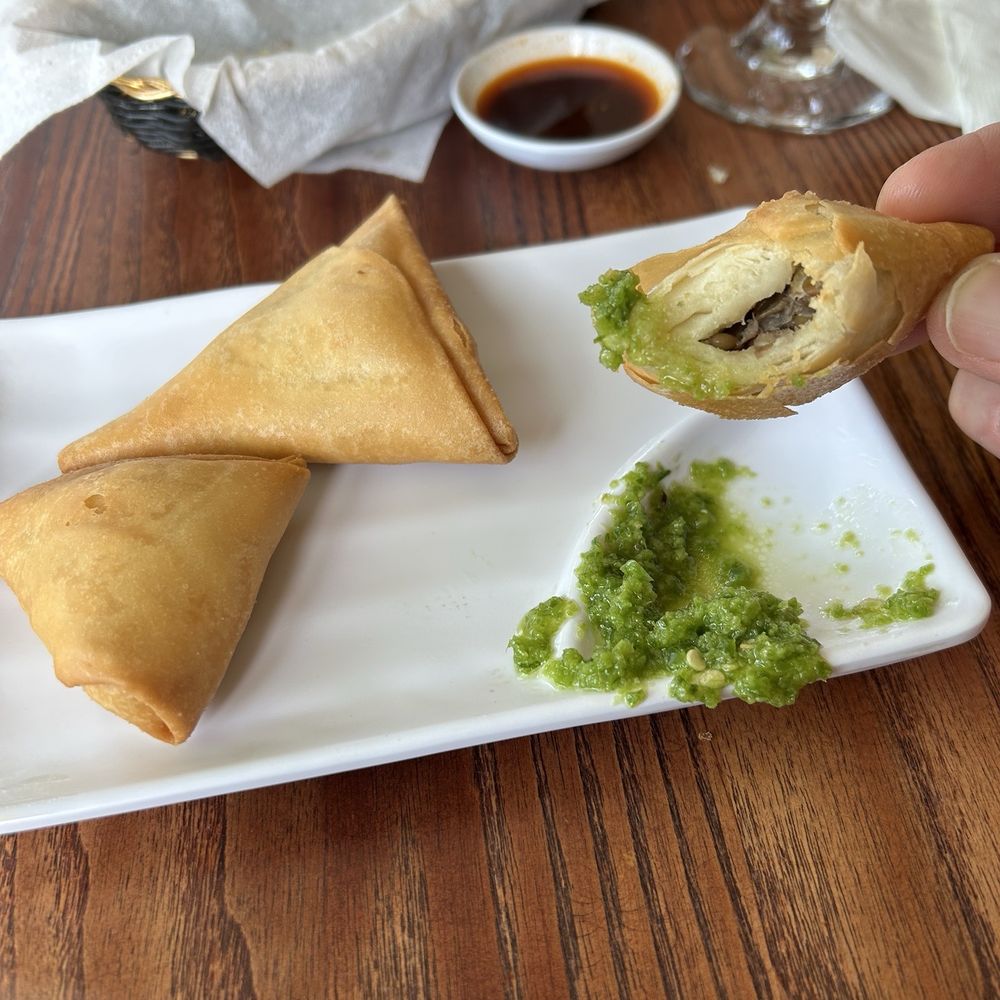 Ethiopic - 2 Veggie (lentil) and  1 beef sambusas. They came 3 to an order and mixing and matching them was offered - Ethiopian Near Me - Washington, DC, District of Columbia