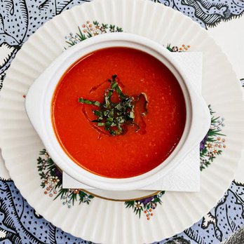 Studio Cafe - a bowl of tomato soup on a plate - Breakfast & Brunch Near Me - Westport, Connecticut Studio Cafe - a bowl of tomato soup on a plate - Breakfast & Brunch Near Me - Westport, Connecticut