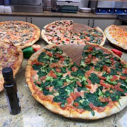 a variety of pizzas a variety of pizzas