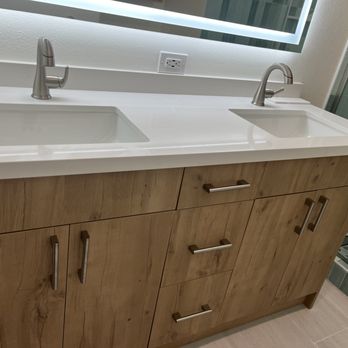 Amcor Construction - New vanity and lighted mirror. - General Contractors Near Me