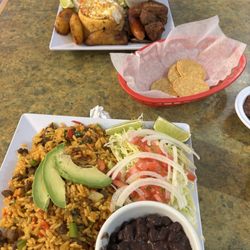 El Rinconcito Latin Food - 24. Arroz con Carne  30. Bandeja Paisa
