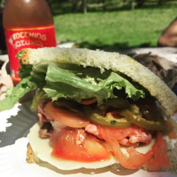 Something Natural - Prime Roast Beef on fresh baked Portuguese bread with lettuce, tomato, hot peppers, pickles, & provolone. - Sandwiches Near Me - Nantucket, Massachusetts