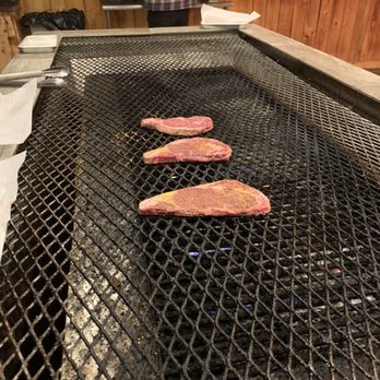 The Outlaw Saloon - Cooking the ribeyes - Steakhouses Near Me - Hatch, Utah The Outlaw Saloon - Cooking the ribeyes - Steakhouses Near Me - Hatch, Utah