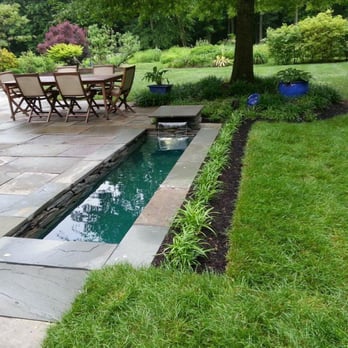 Landmark Landscapes - a patio with a small pond - Landscaping Near Me - Garnet Valley, Pennsylvania Landmark Landscapes - a patio with a small pond - Landscaping Near Me - Garnet Valley, Pennsylvania