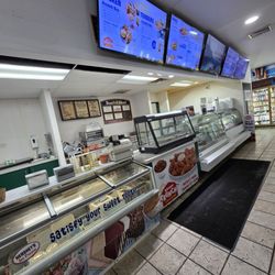 Country Fixin's "Deli" - The Deli with all the menu signs of the products they have available.