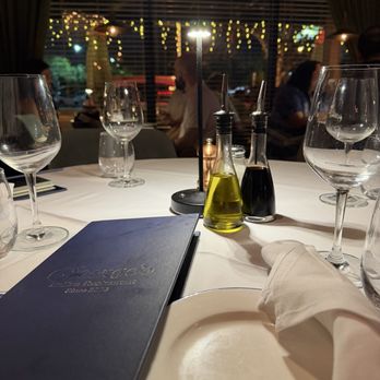 George's Restaurant & Lounge - Table setting, main dining room - Italian Near Me - Miami Beach, Florida George's Restaurant & Lounge - Table setting, main dining room - Italian Near Me - Miami Beach, Florida
