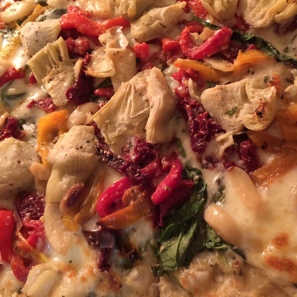 Mezza Luna Pizzeria - Garden pizza, look at all the flavors here! Yummy chunks of goodness! - Pizza Near Me - Eugene, Oregon Mezza Luna Pizzeria - Garden pizza, look at all the flavors here! Yummy chunks of goodness! - Pizza Near Me - Eugene, Oregon