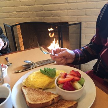 Geyserville Grille - Eggs Benedict by the fireplace. - American Near Me - Geyserville, California