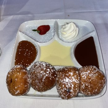 Max's Es-Ca - Beignet (donuts with raspberry filling and sauces- caramel, condensed milk, chocolate, from left to right) - Italian Near Me - Staten Island, New York Max's Es-Ca - Beignet (donuts with raspberry filling and sauces- caramel, condensed milk, chocolate, from left to right) - Italian Near Me - Staten Island, New York