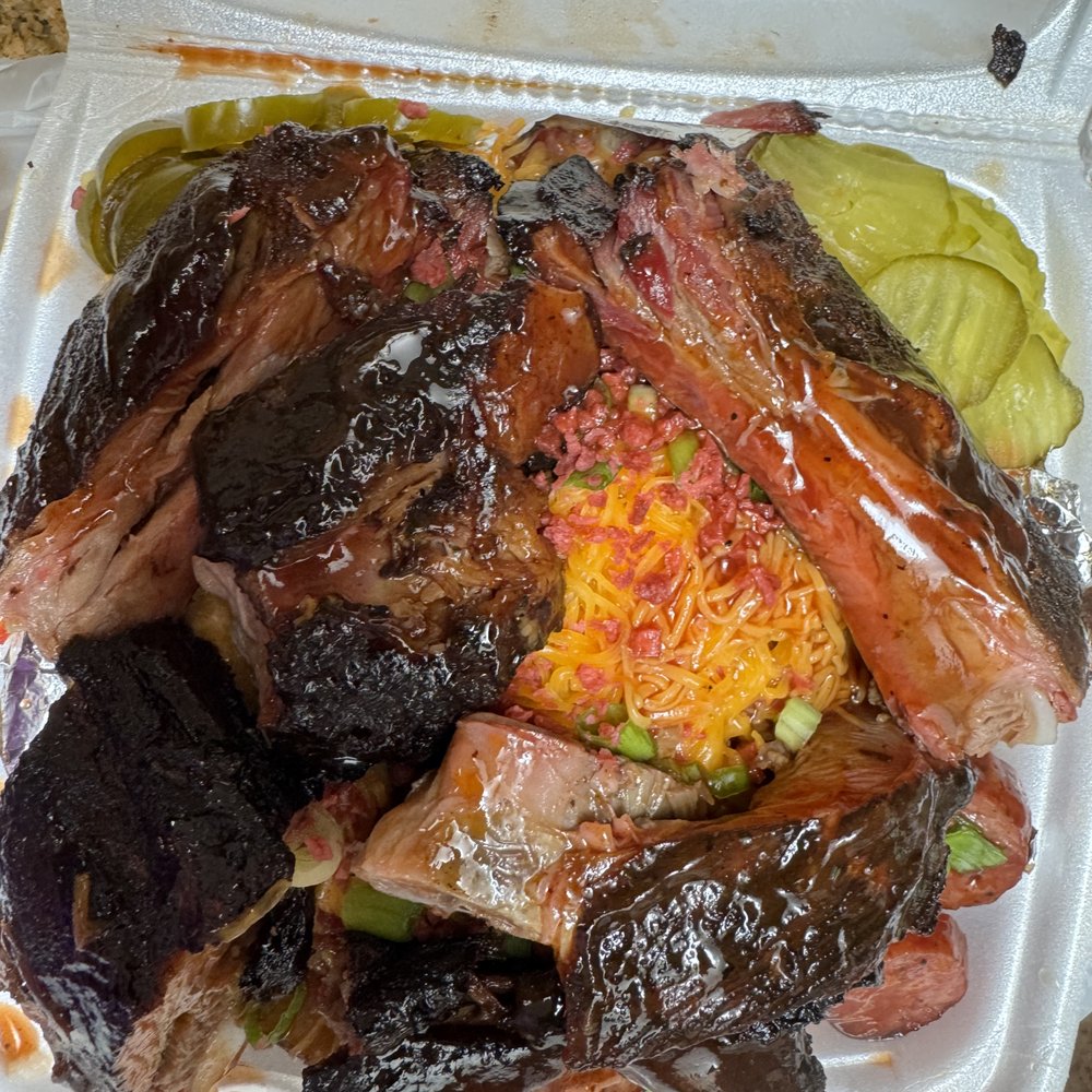 Kooly's BBQ - Loaded baked potato. ribs/sausage - Barbeque Near Me - Dallas, Texas