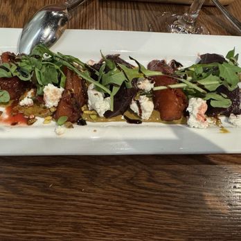 The Purple Pig - Beet salad with goat cheese and crushed pistachios - Tapas/Small Plates Near Me - Chicago, Illinois