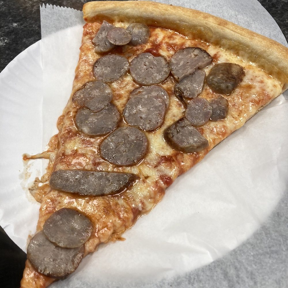 Lucia Pizza - Sausage Pizza Slice - Pizza Near Me - Flushing, New York Lucia Pizza - Sausage Pizza Slice - Pizza Near Me - Flushing, New York
